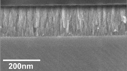 Negative oxygen ion impingement on SiO2 thin films during growth